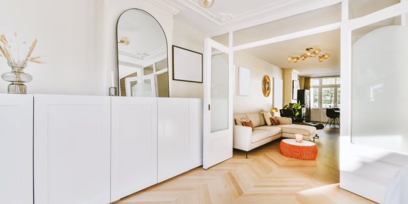 A mind-blowing daylight room with plenty of wardrobes and beautiful parquet flooring